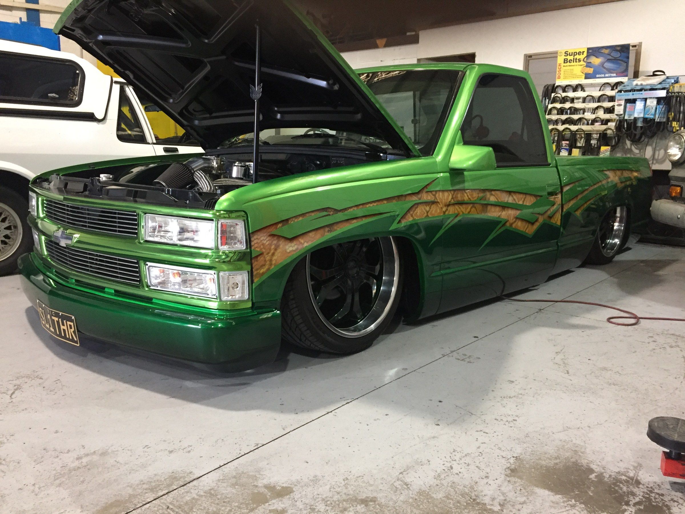 Green custom Chevrolet ute inside the Superior Mechanical workshop